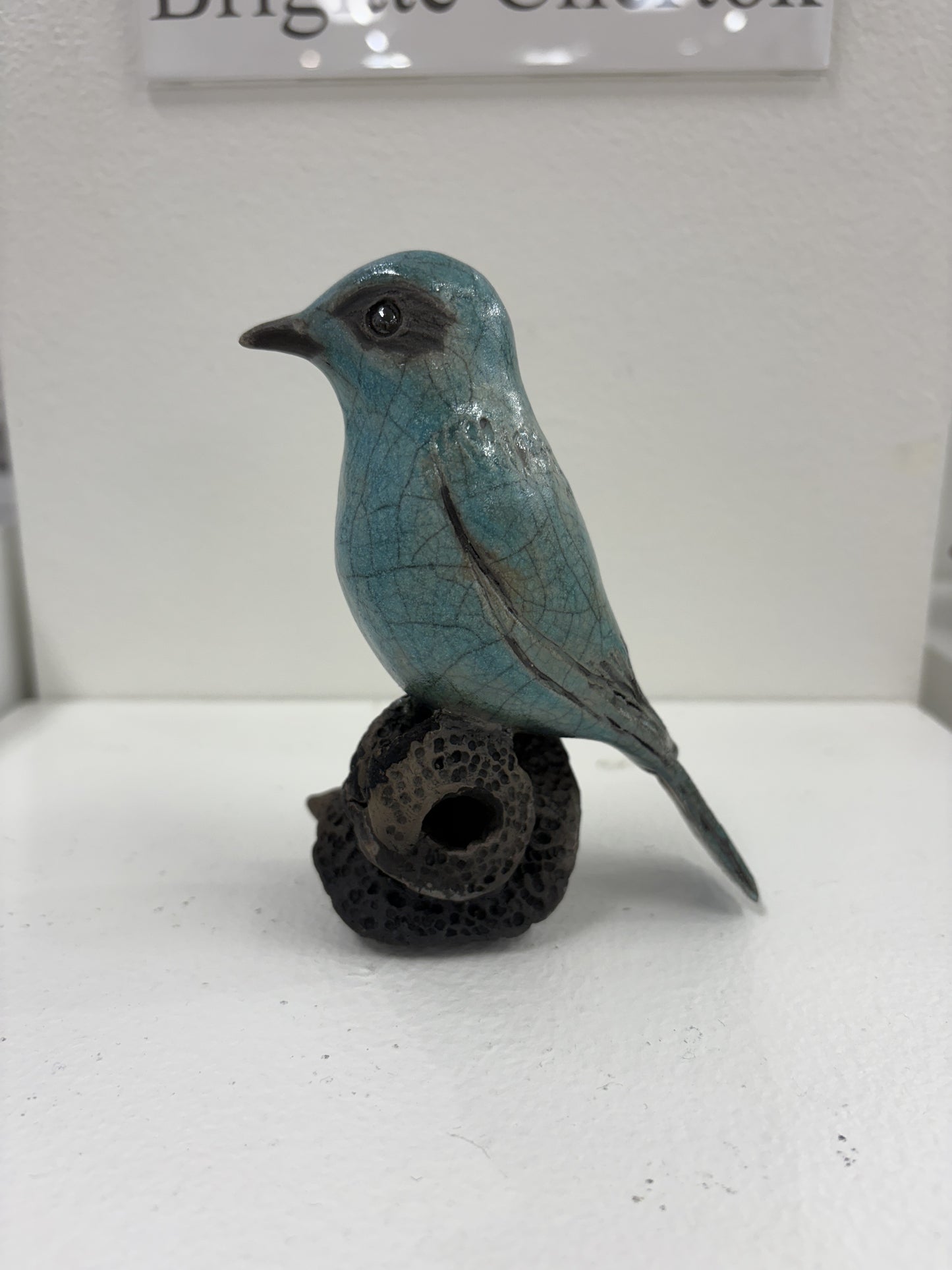 Raku Bird turquoise On Swirly Branch