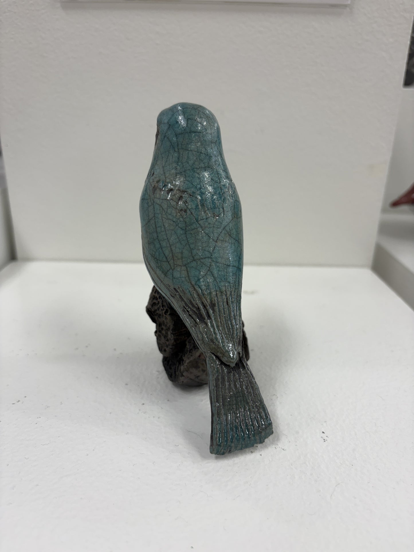 Raku Bird turquoise On Swirly Branch